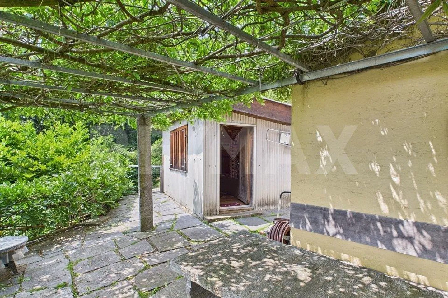 Un refuge dans le vert Maison de vacances rustique avec vue dégagée sur le lac de Lugano - Photo 3 sur 13