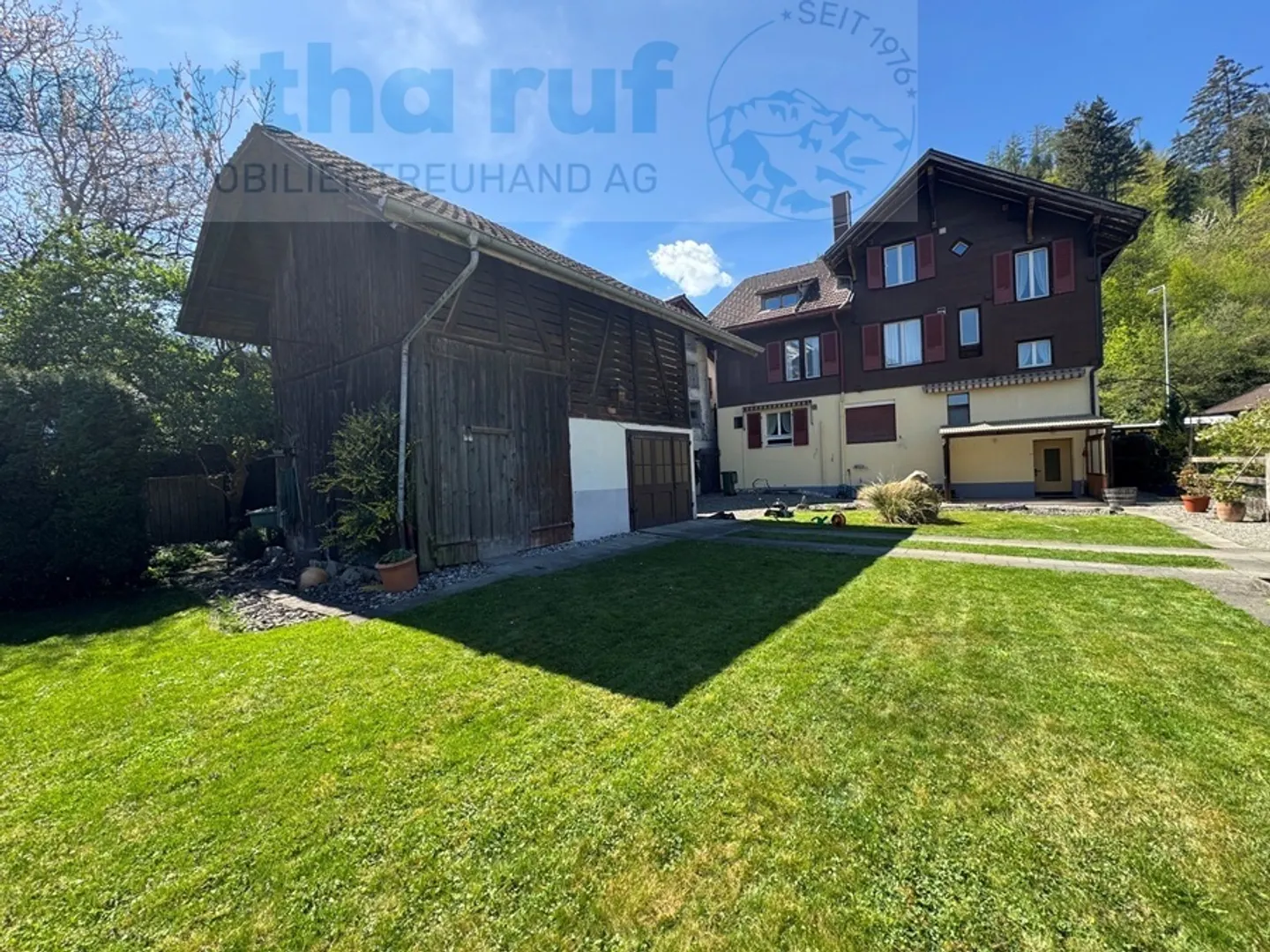 Multi-family house with 3 units, barn and large garden - Photo 20 of 22