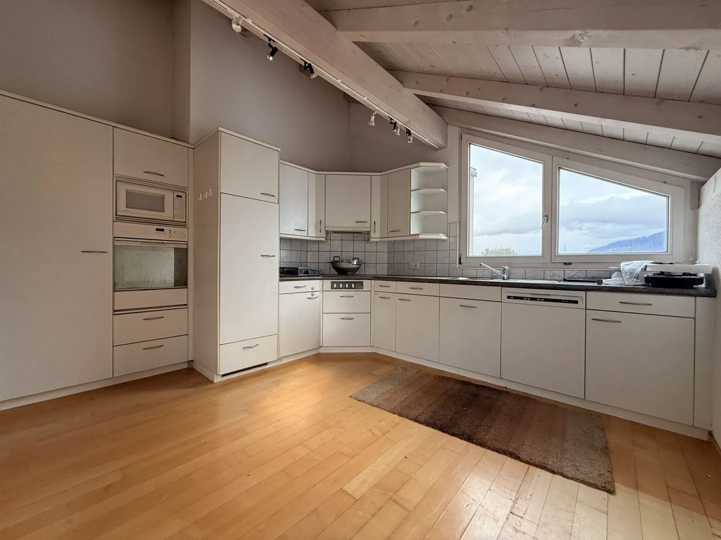 Penthouse spacieux de 3,5 pièces au centre de Buchs-Räfis - Photo 4 sur 10