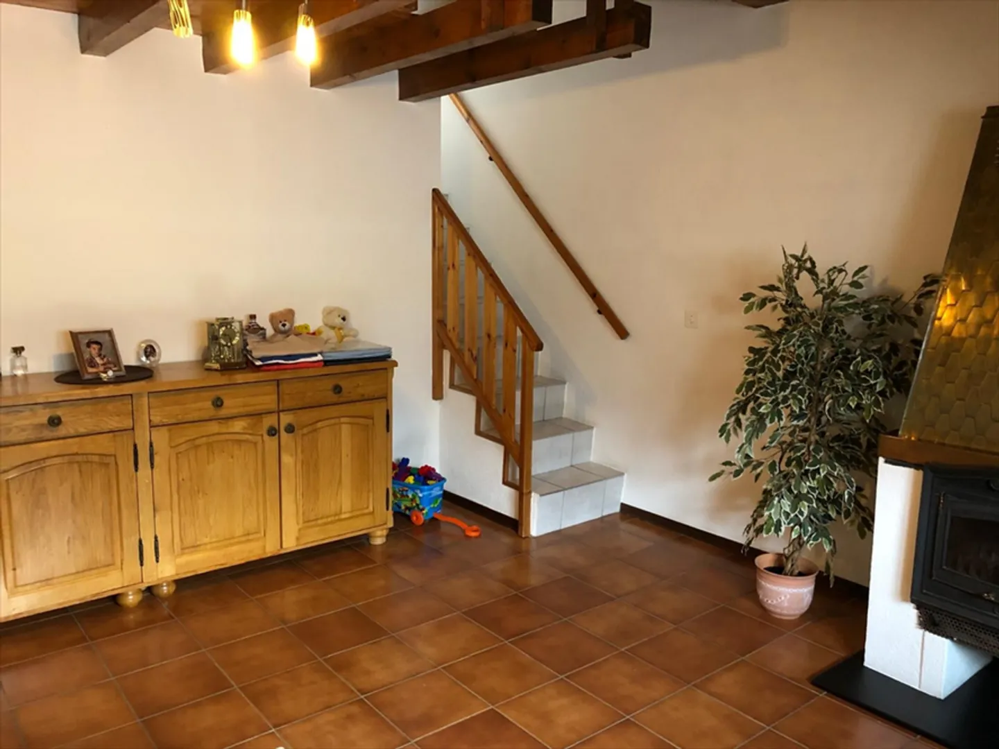 Logement en duplex avec cheminée - Photo 3 sur 9