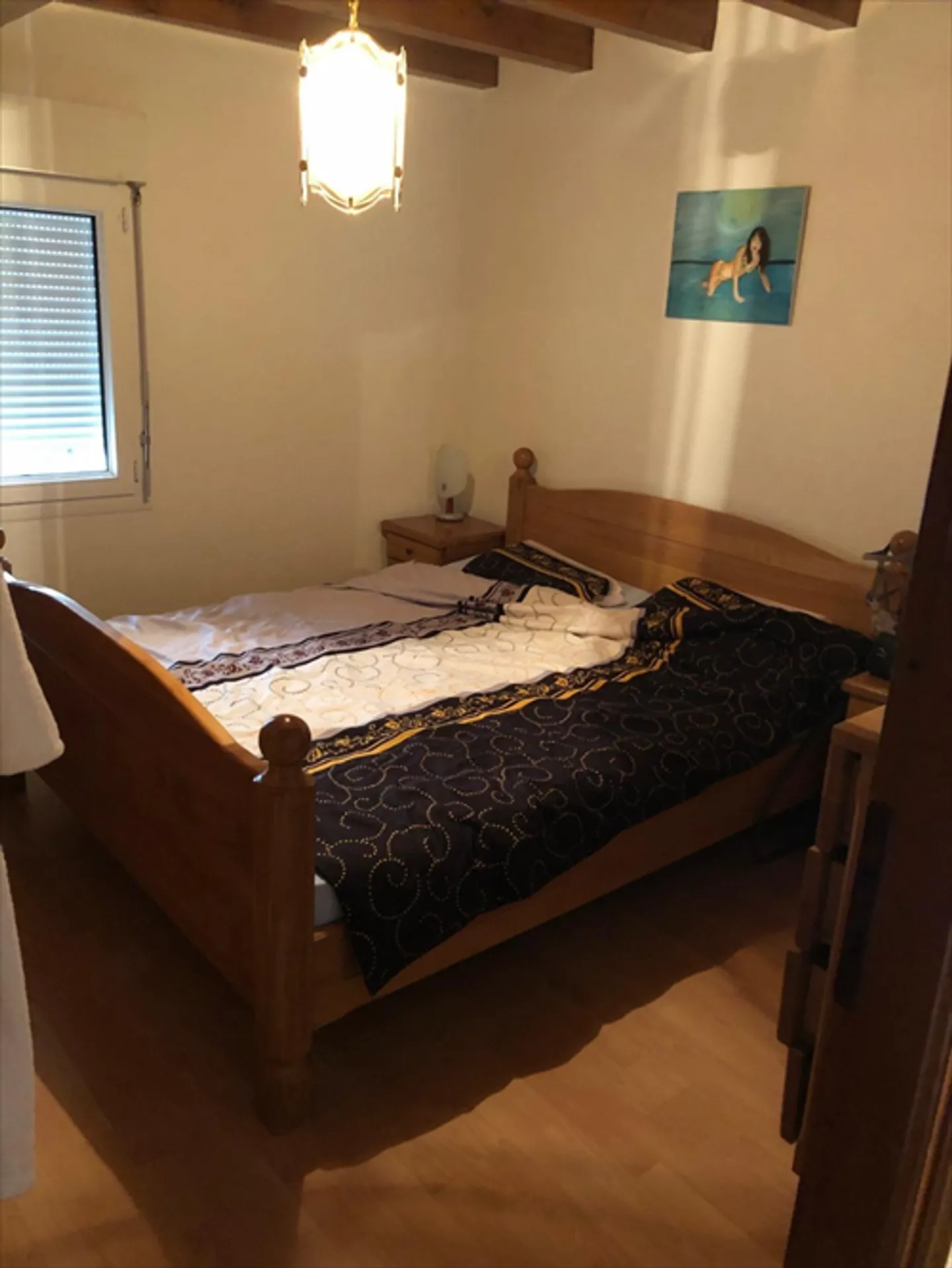 Logement en duplex avec cheminée - Photo 4 sur 9