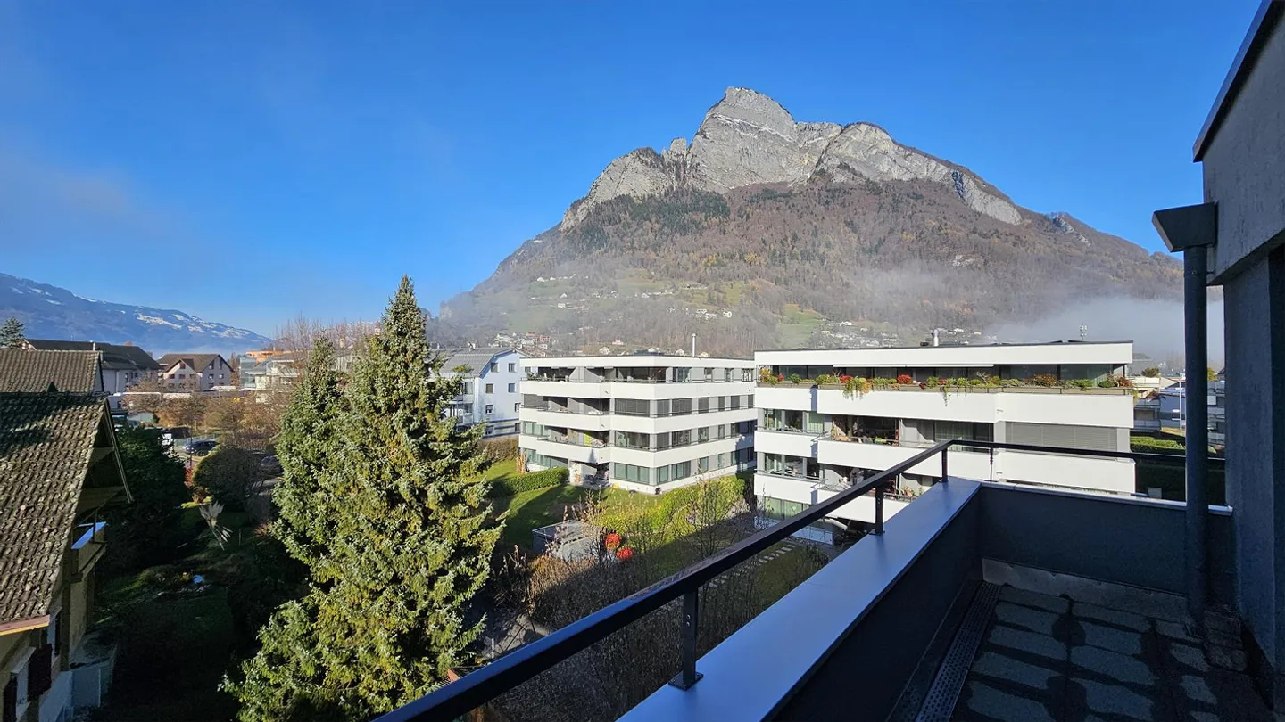 Appartement sous les toits lumineux de 4,5 pièces - Photo 1 sur 13