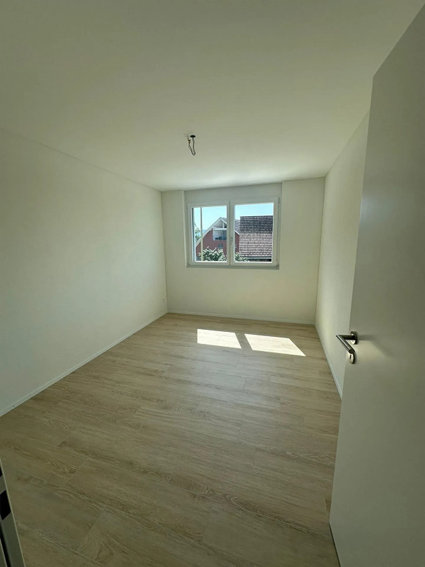 Appartement moderne avec balcon et emplacement central - Photo 6 sur 6