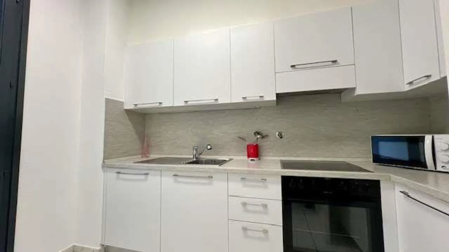 Appartement lumineux avec grande terrasse couverte et potentiel pour deux unités - Photo 6 sur 13