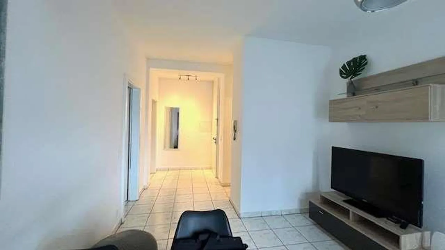 Appartement lumineux avec grande terrasse couverte et potentiel pour deux unités - Photo 7 sur 13