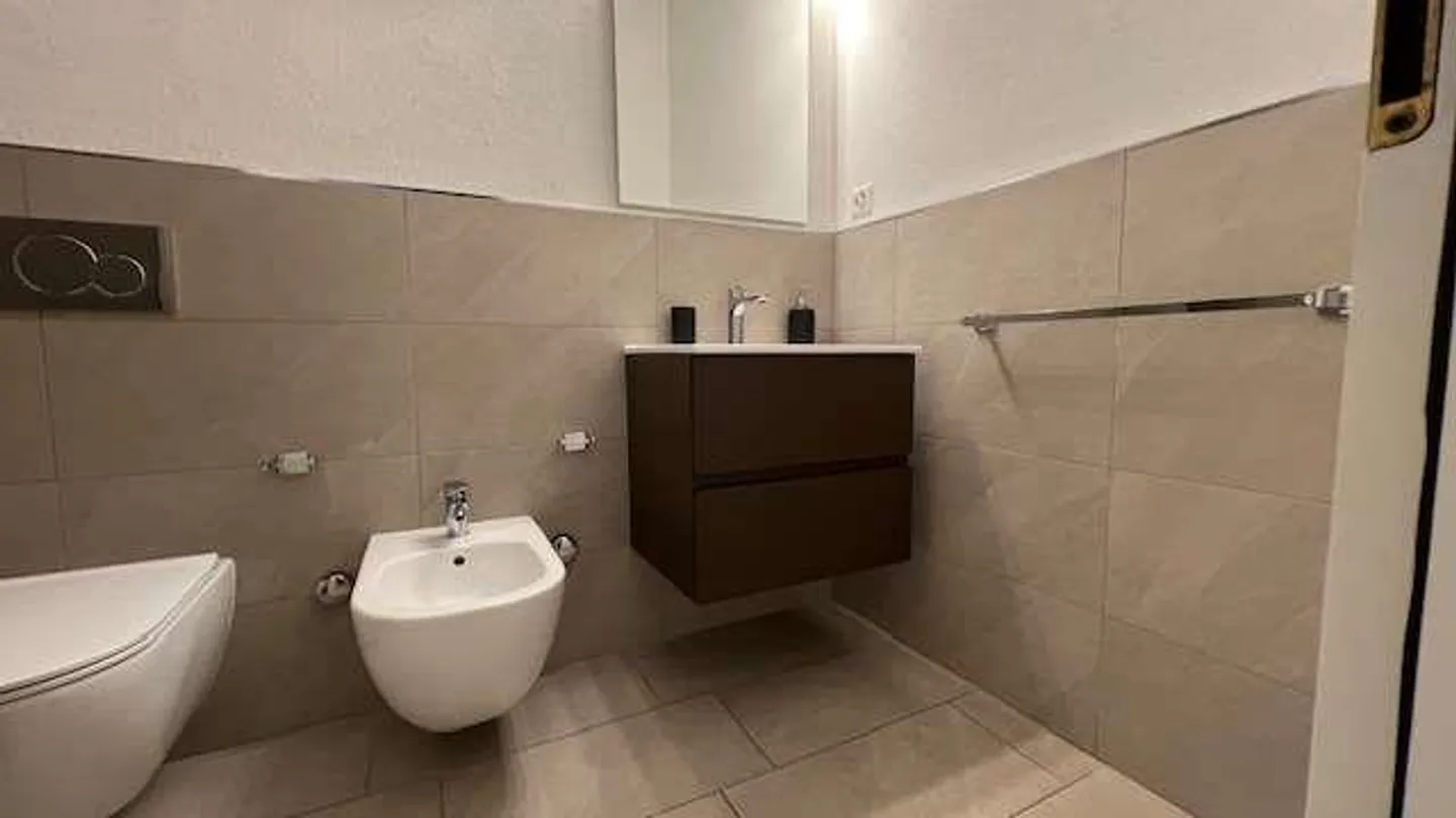 Appartement lumineux avec grande terrasse couverte et potentiel pour deux unités - Photo 8 sur 13