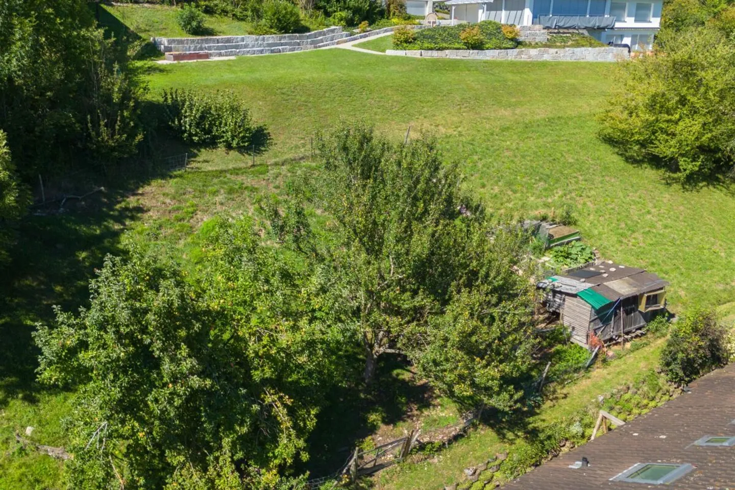 Spacious 6.5-room single-family house with a separate apartment, double garage, 1,053 m² garden paradise, and panoramic views of the Alps - Photo 29 of 31