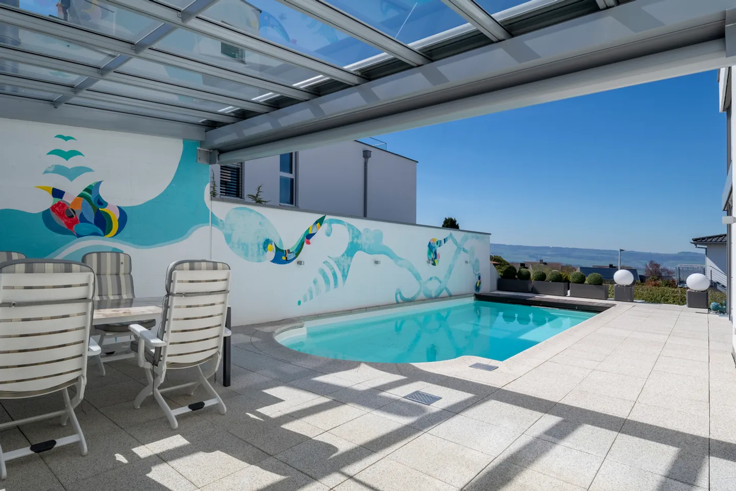 Panoramic view at its finest: Top-modern single-family house with pool - Photo 5 of 11
