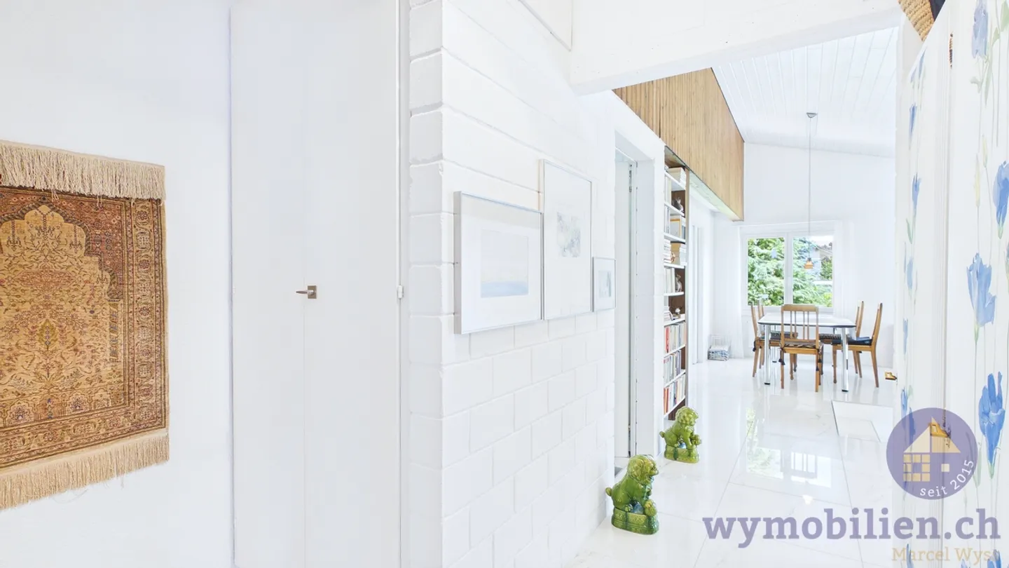 Casa con architettura unica e giardino da sogno - Foto 11 di 21