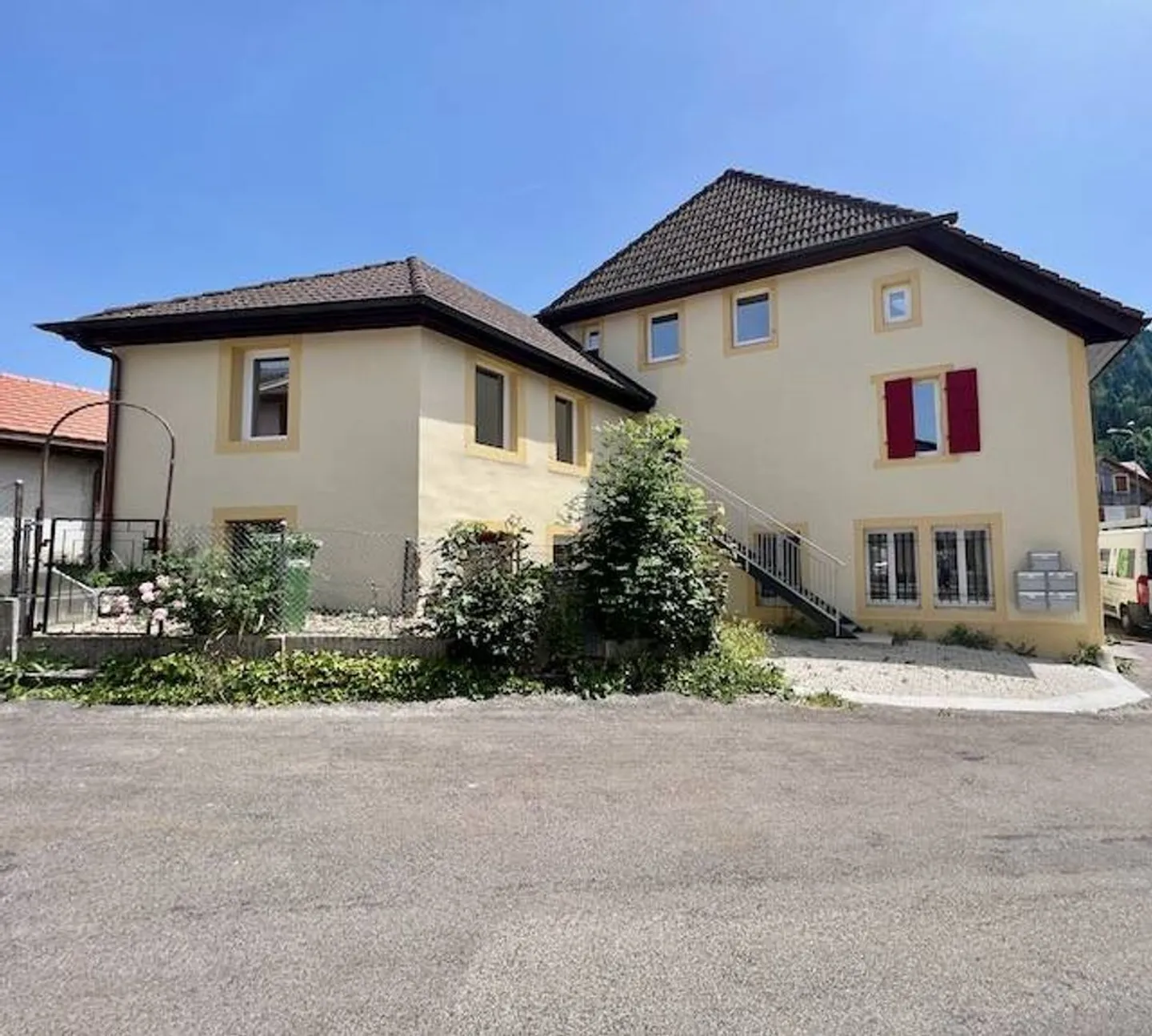 Mixed-Use Building in Couvet - Photo 1 of 13