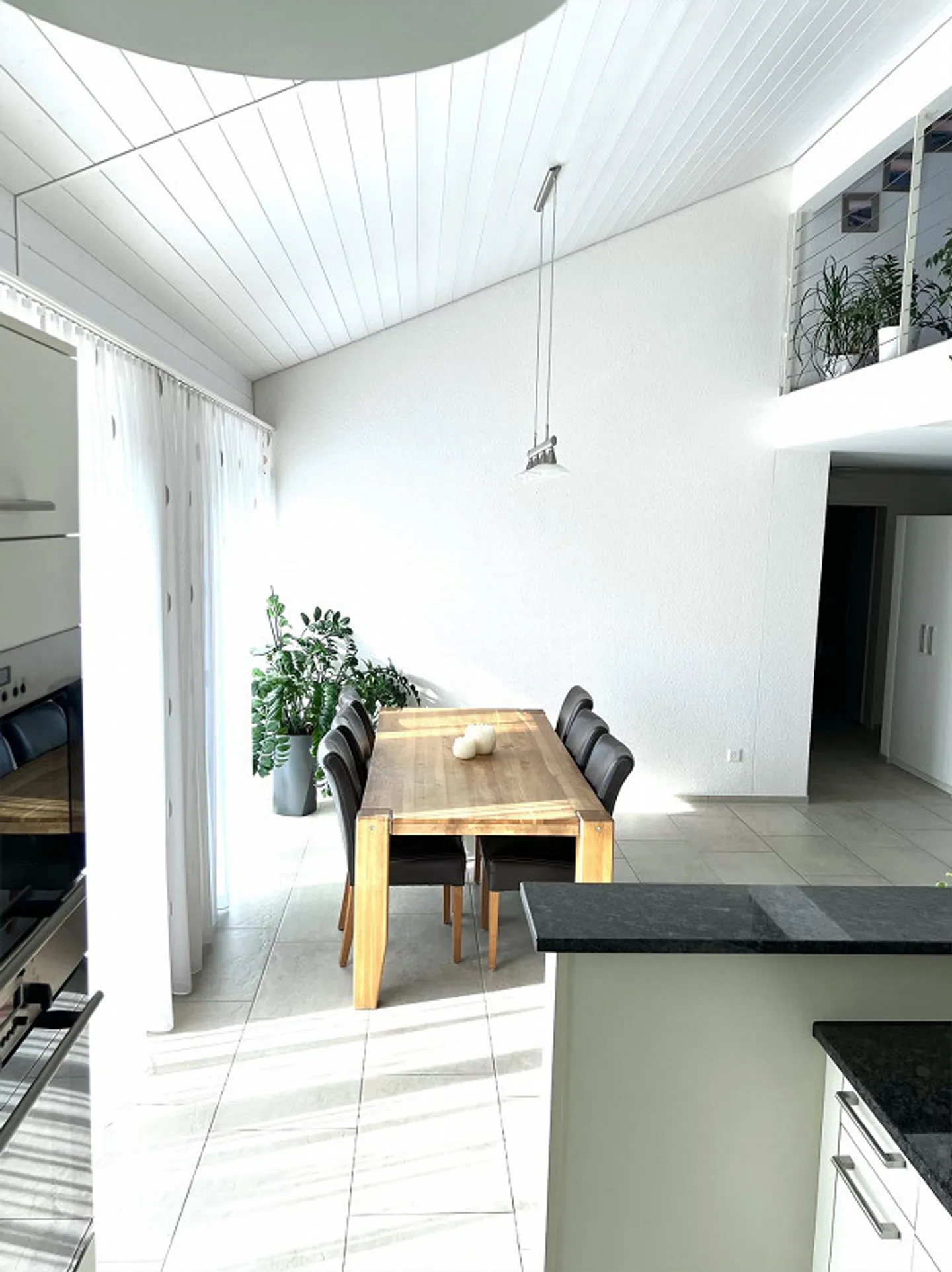 Appartement en duplex lumineux de 4,5 pièces - Photo 3 sur 11