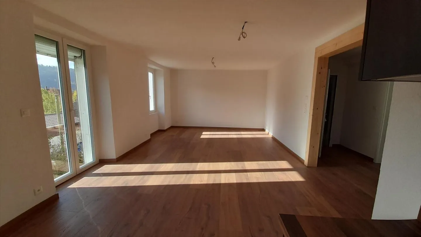 St-Imier, beautiful 3.5-room apartment on the ground floor with access to the garden - Photo 2 of 4