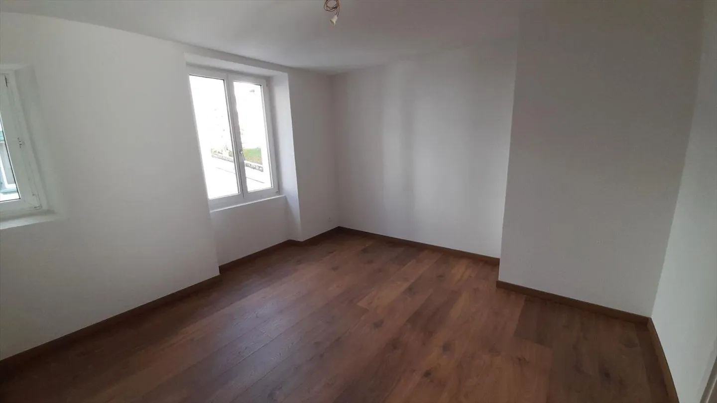 St-Imier, beautiful 3.5-room apartment on the ground floor with access to the garden - Photo 3 of 4