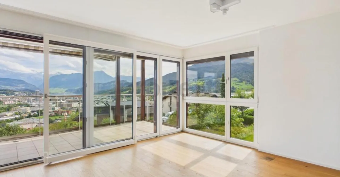 Stunning view of Lake Lucerne: Cozy fireplace, utility room with washing tower and two underground parking spaces - Photo 1 of 12