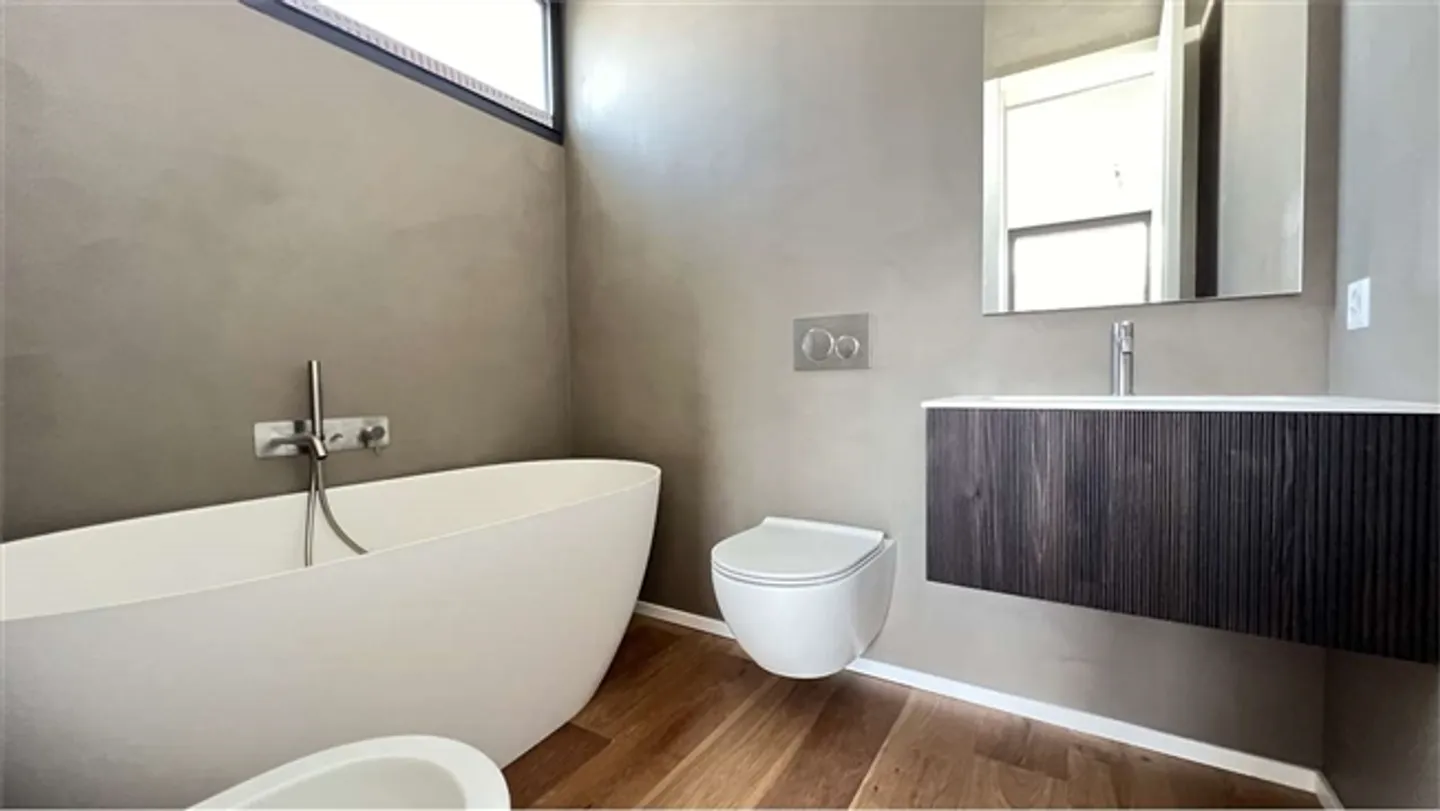 NOUVEAU BÂTIMENT À CADEMPINO AVEC JARDIN PRIVÉ - Photo 4 sur 14