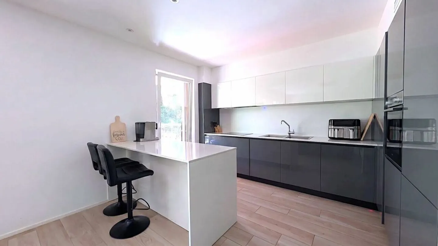 Appartement lumineux avec jardin et grande terrasse - Photo 7 sur 12