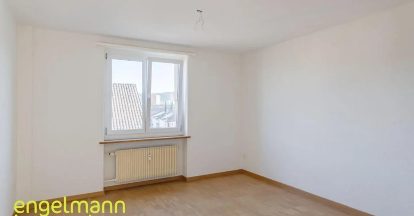 Appartement mansardé de 3 pièces - Photo 2 sur 3