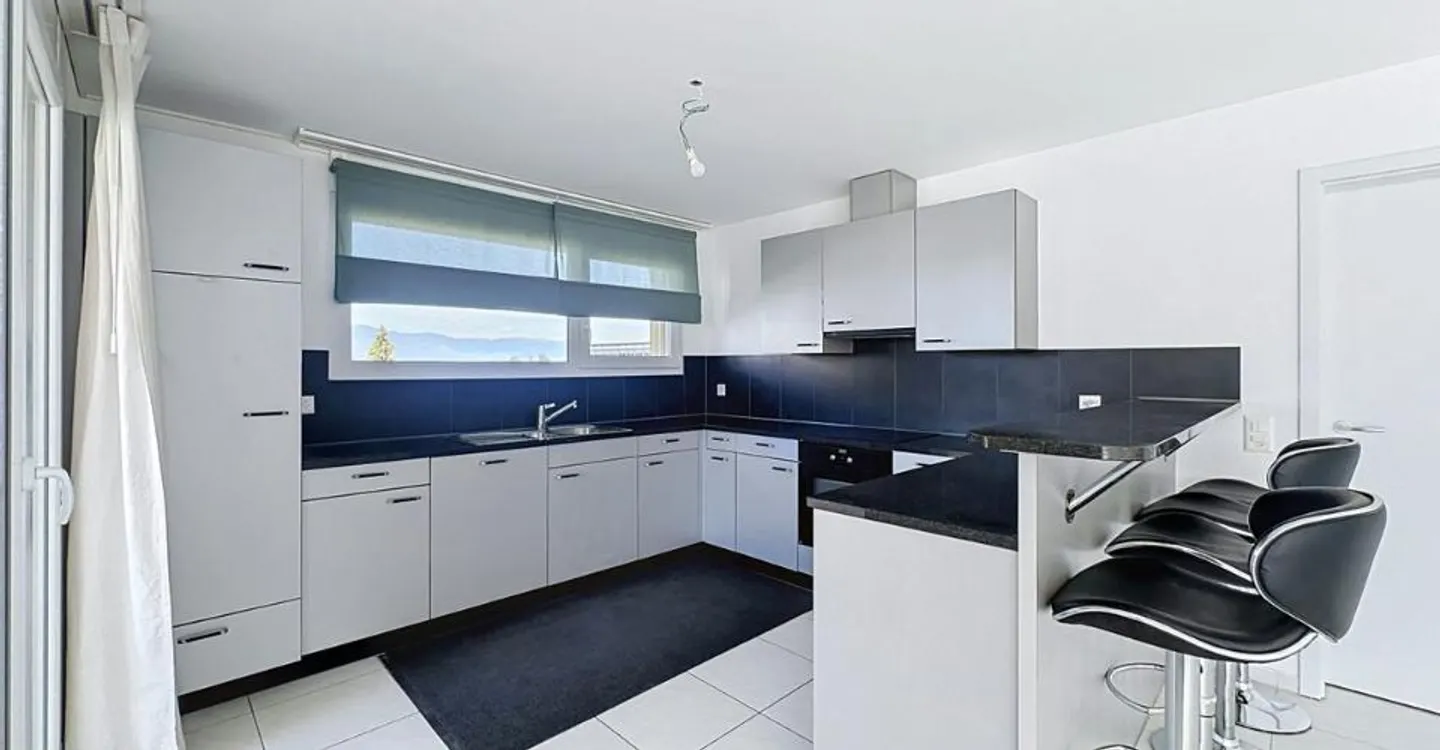 Renovierte Dachgeschosswohnung mit Seeblick - Foto 7 von 13