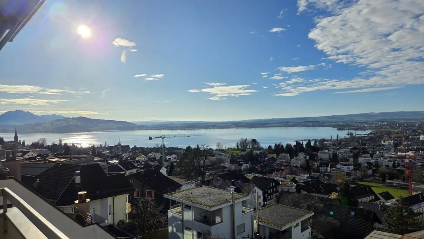 Wunderschöne Attikawohnung mit Seesicht - Foto 1 von 10