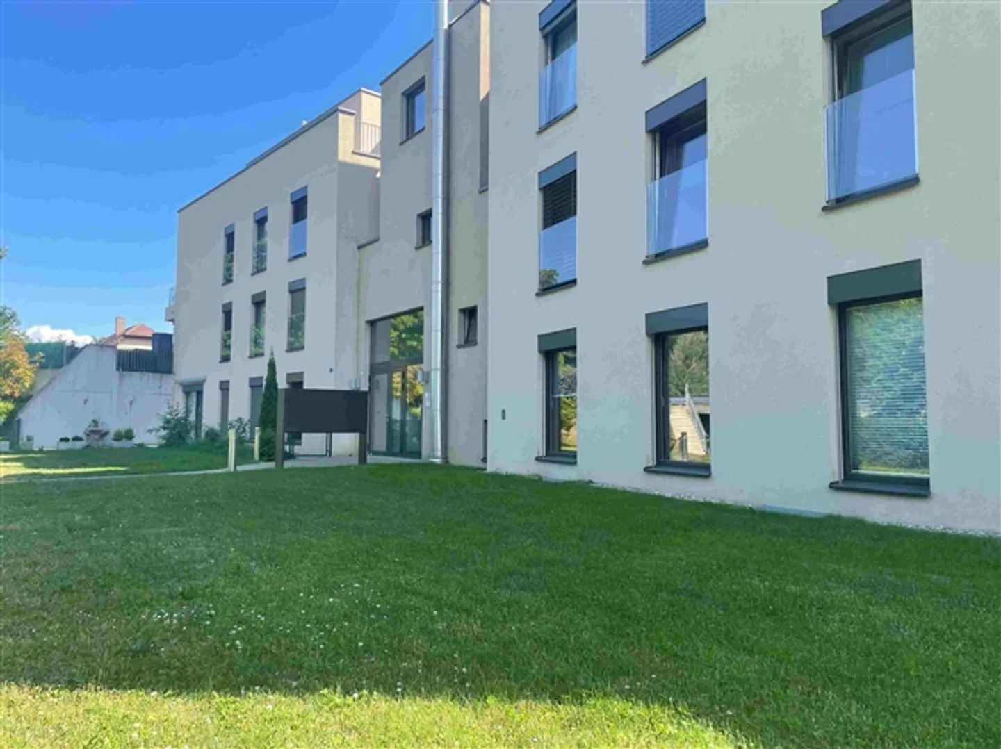 Appartement lumineux de 3,5 pièces avec balcon, dans un environnement calme - Photo 1 sur 4