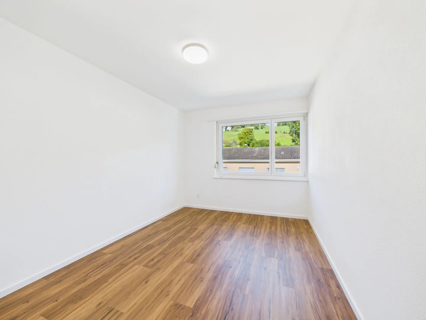 Charmante Dachwohnung mit Aussicht - Foto 6 von 7