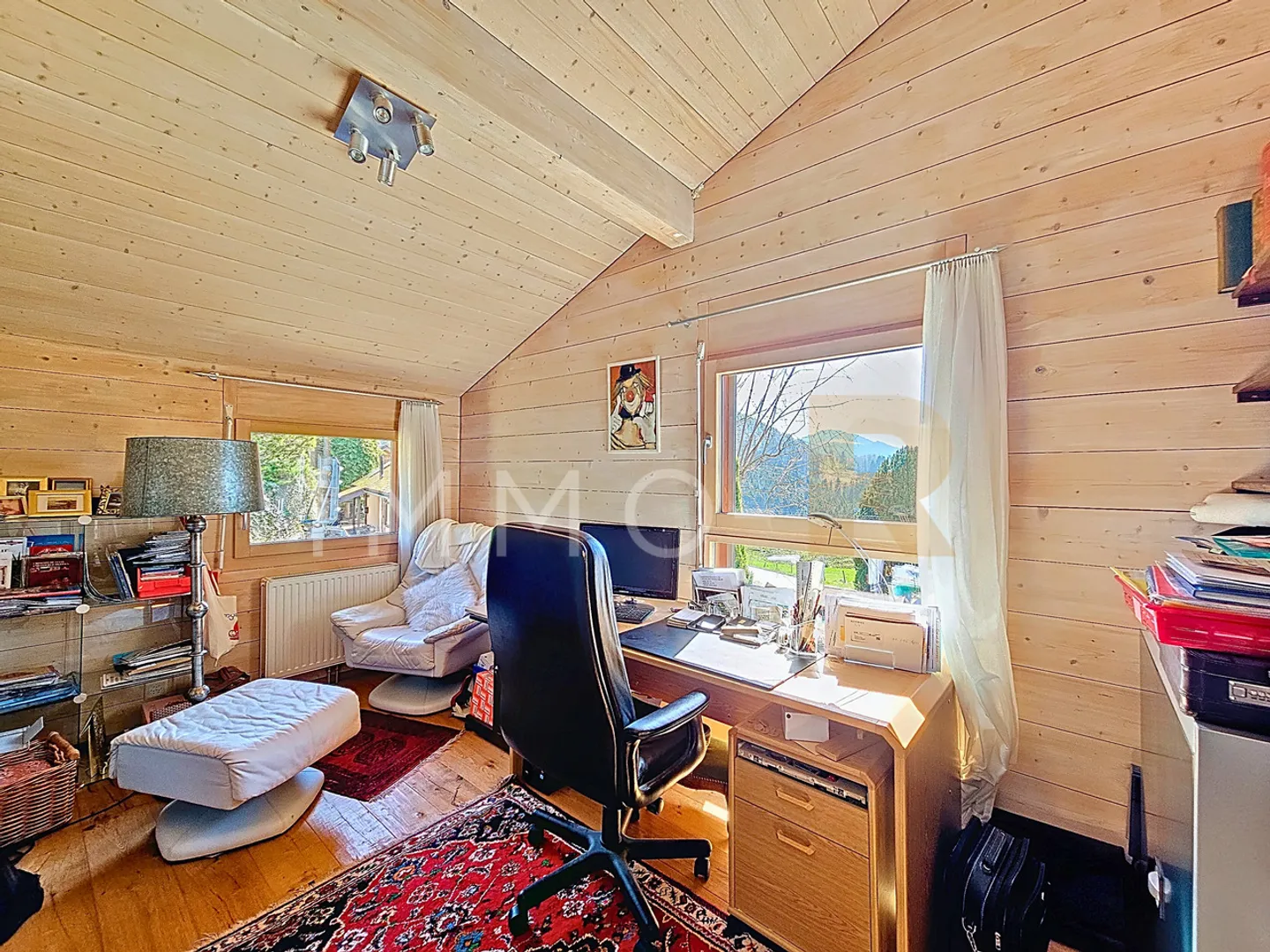 Charming 5.5-room apartment in a chalet - Photo 10 of 11