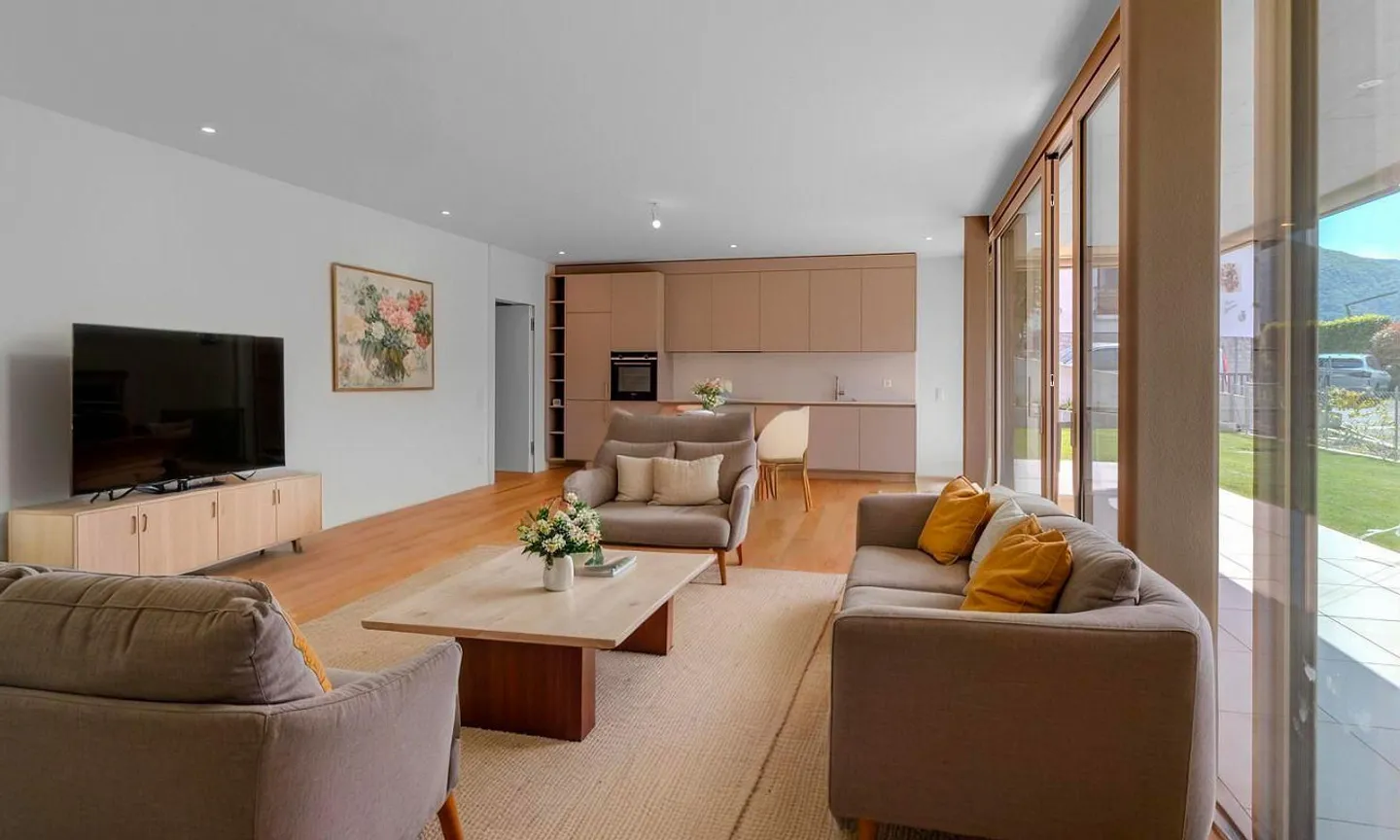 NUOVO: 2,5 camere con giardino e vista lago a Bissone - Foto 5 di 9