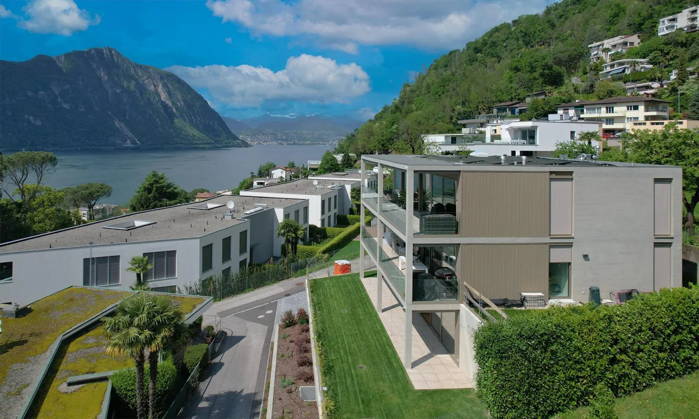 NUOVO: 2,5 camere con giardino e vista lago a Bissone - Foto 9 di 9