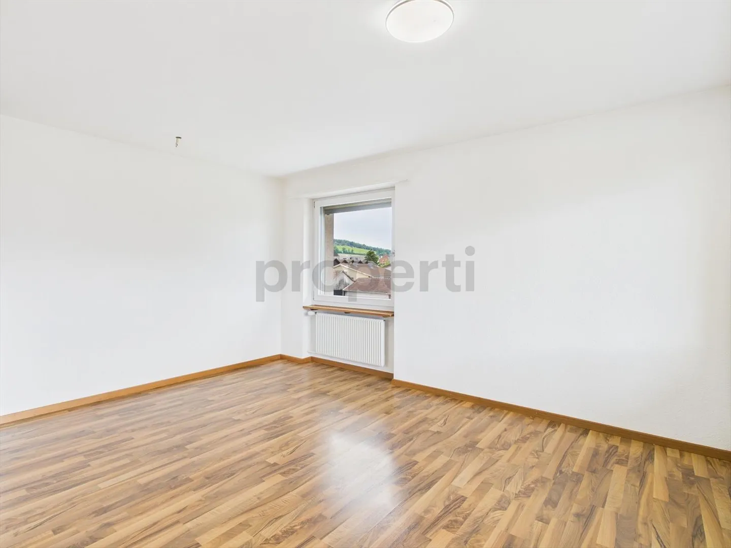 Appartement 3.5 pièces - Photo 6 sur 8