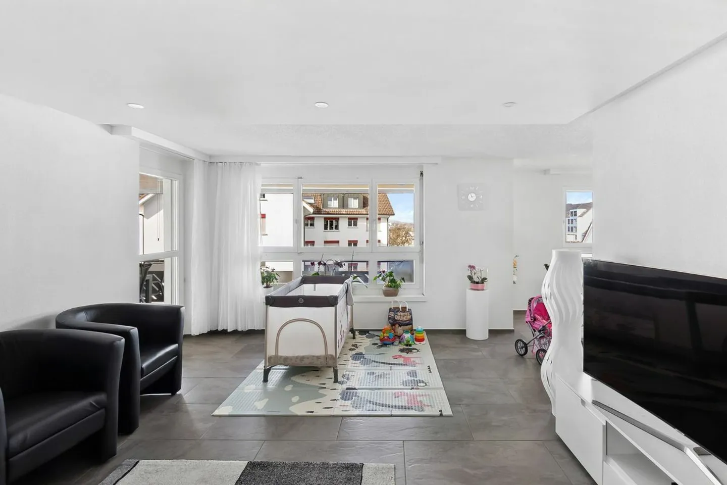 LIVING IN A CENTRAL, SUNNY LOCATION - Photo 2 of 8