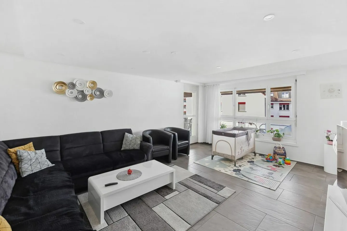 LIVING IN A CENTRAL, SUNNY LOCATION - Photo 7 of 8