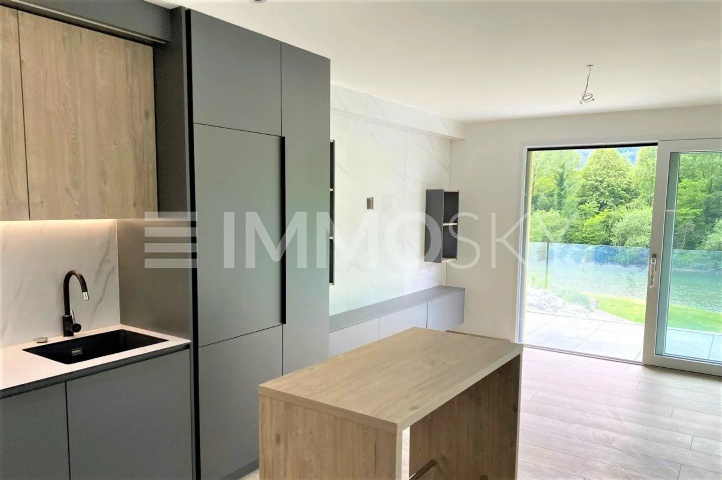 Neu, modern und mit Flussblick - Foto 2 von 5