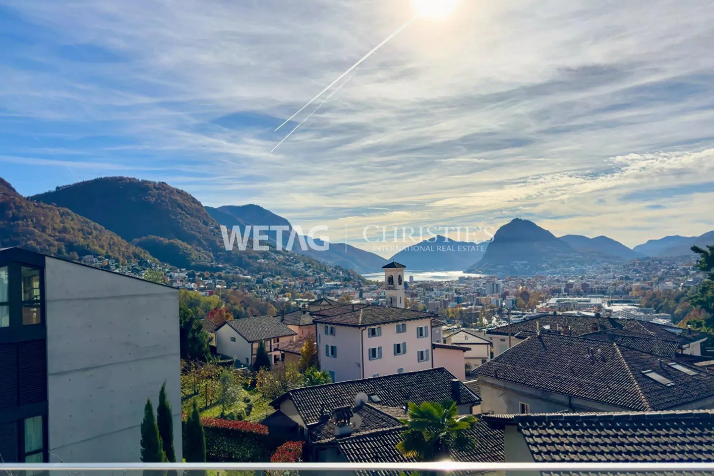 Elegant penthouse apartment in shell condition for sale in Lugano-Canobbio, with panoramic terrace & view of Lake Lugano - Photo 1 of 11