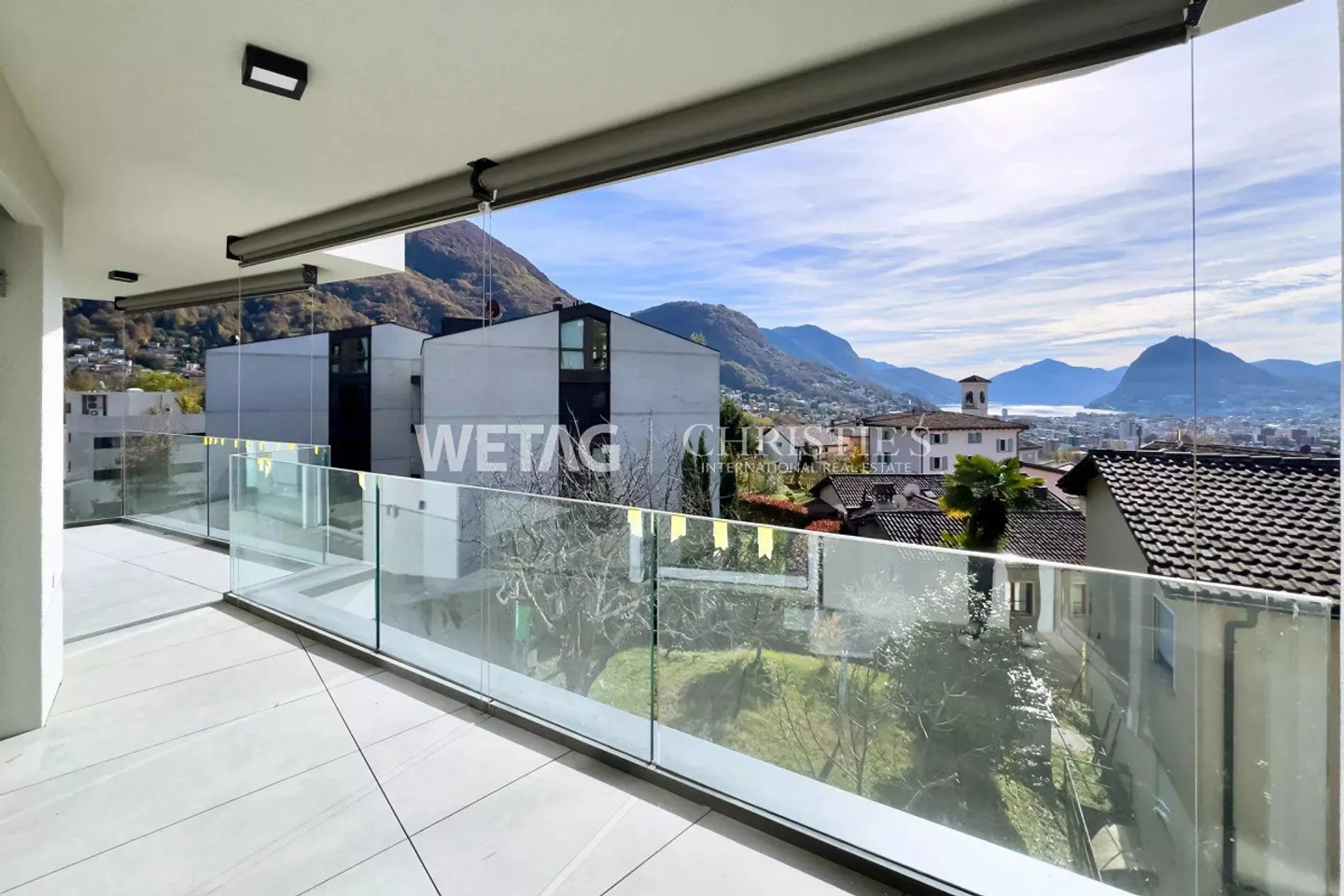 Elegant penthouse apartment in shell condition for sale in Lugano-Canobbio, with panoramic terrace & view of Lake Lugano - Photo 8 of 11
