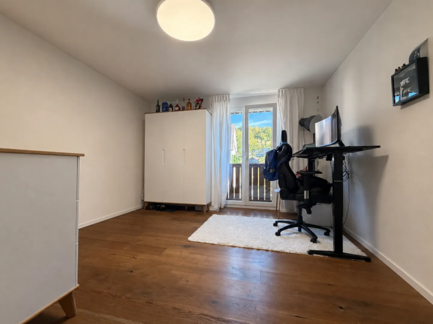 Moderno appartamento di 4.5 locali con balcone e vista sul verde - Foto 3 di 19