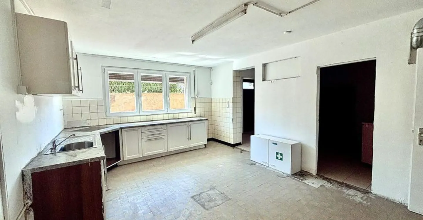 Gewerbefläche und 2,5-Zimmer-Wohnung - Foto 5 von 12