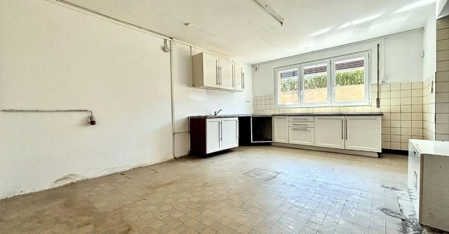 Gewerbefläche und 2,5-Zimmer-Wohnung - Foto 4 von 12