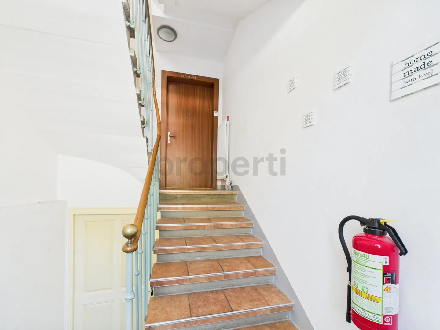 Rental building with 2 apartments, workshop and large plot in Noiraigue - Photo 9 of 10