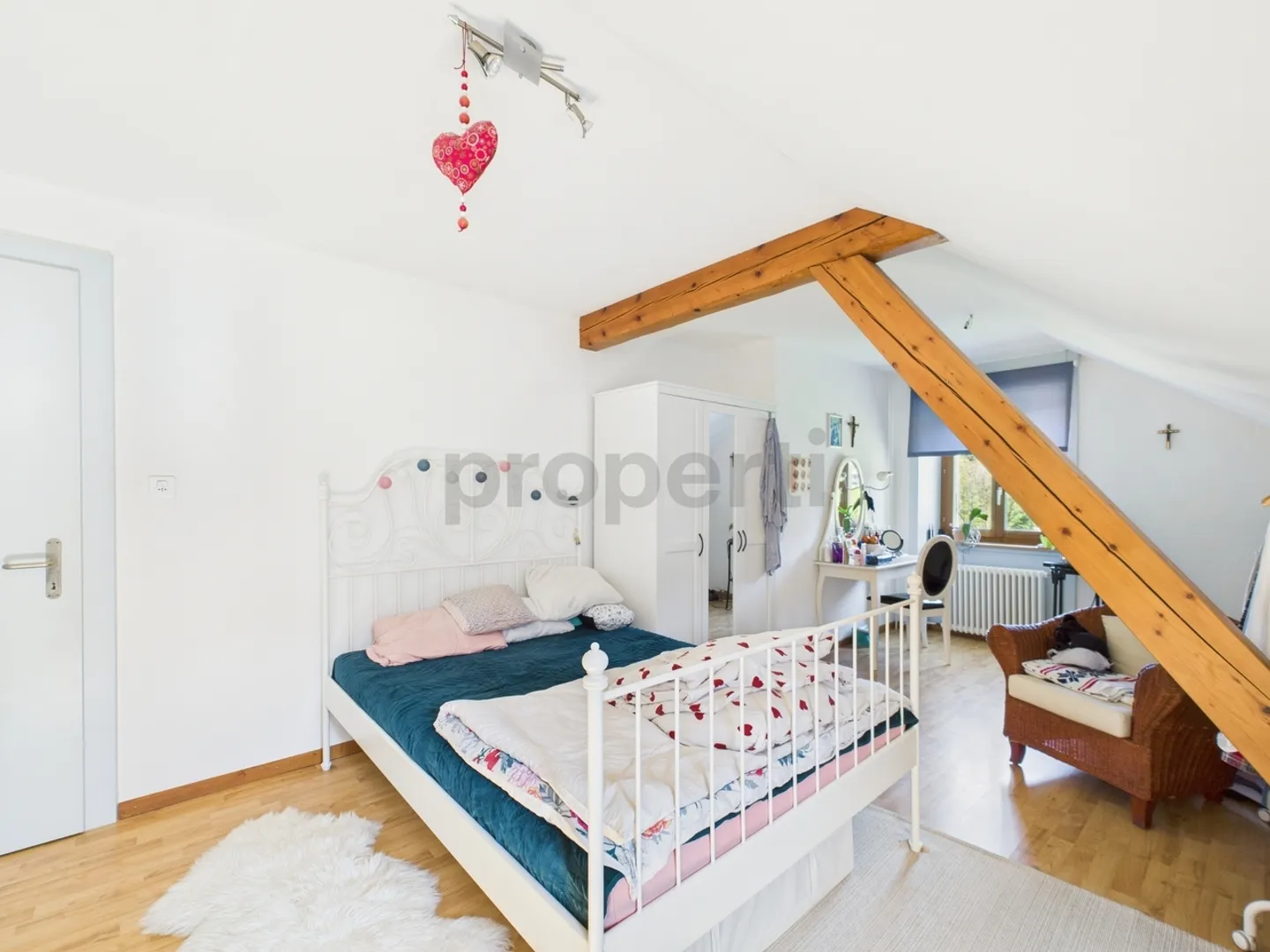 Rental building with 2 apartments, workshop and large plot in Noiraigue - Photo 4 of 10