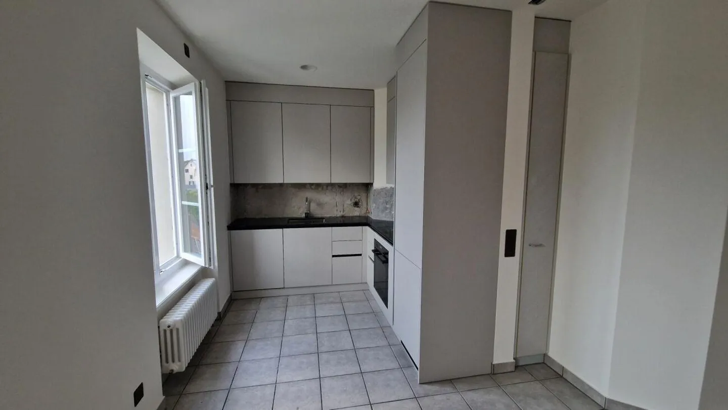 Charmante appartement 2 pièces au cœur de Frauenfeld - Photo 2 sur 4