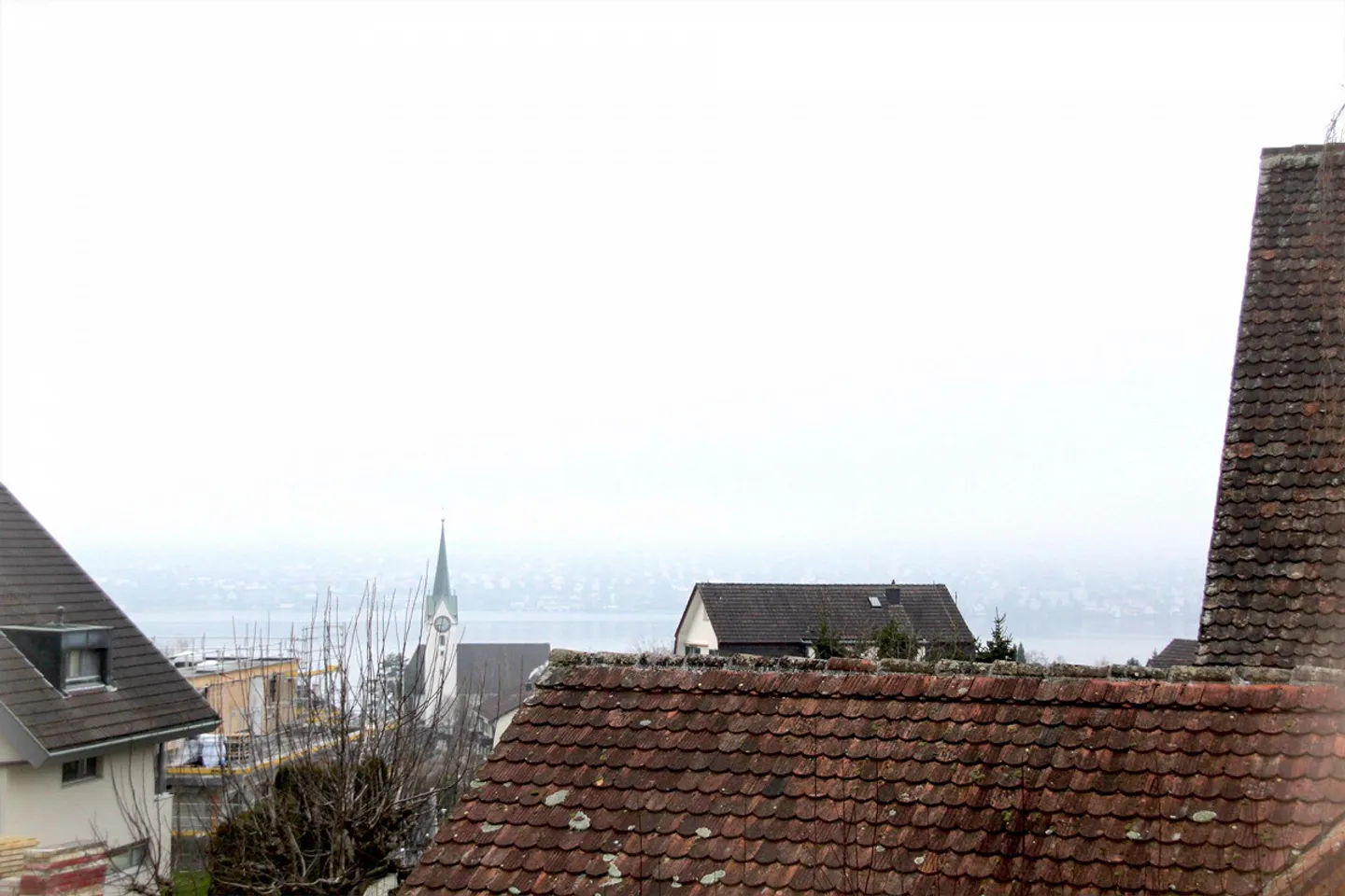 Attic apartment with large terrace and lake view - Photo 1 of 10