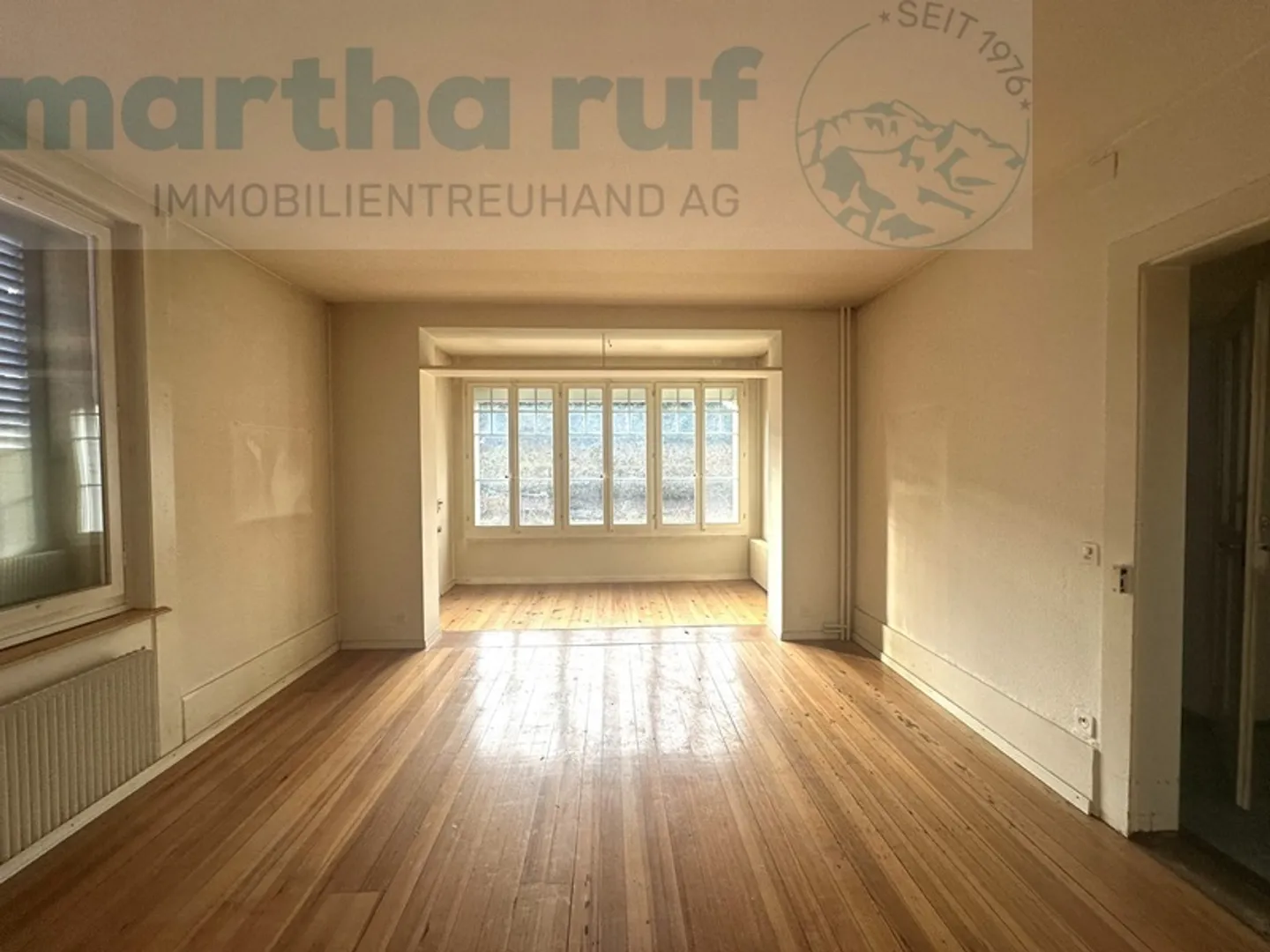 Zentral und sonnig gelegenes 3-Familienhaus mit viel Potenzial - Foto 3 von 23