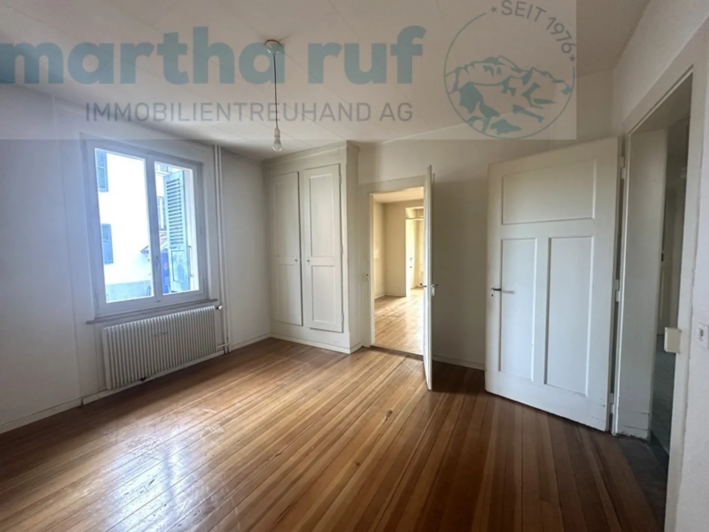 Zentral und sonnig gelegenes 3-Familienhaus mit viel Potenzial - Foto 4 von 23