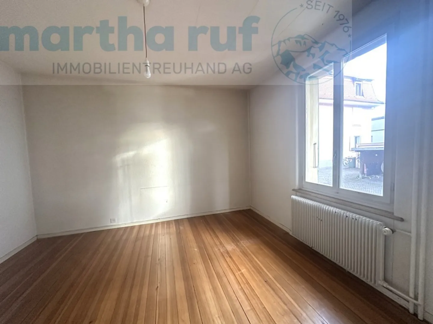 Zentral und sonnig gelegenes 3-Familienhaus mit viel Potenzial - Foto 5 von 23