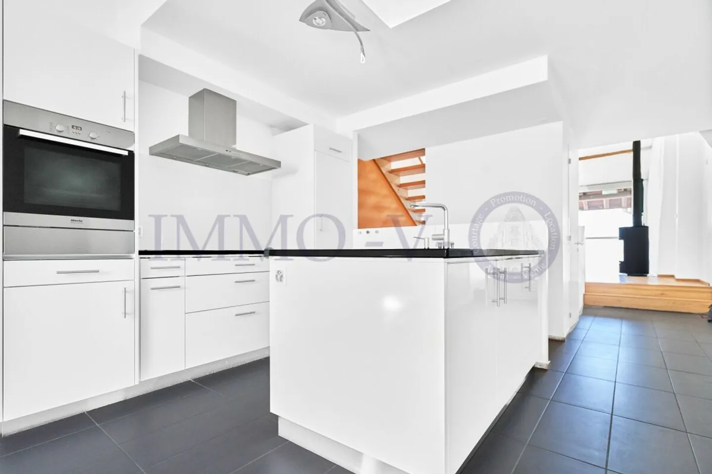 Duplex spacieux rénové - Photo 5 sur 9