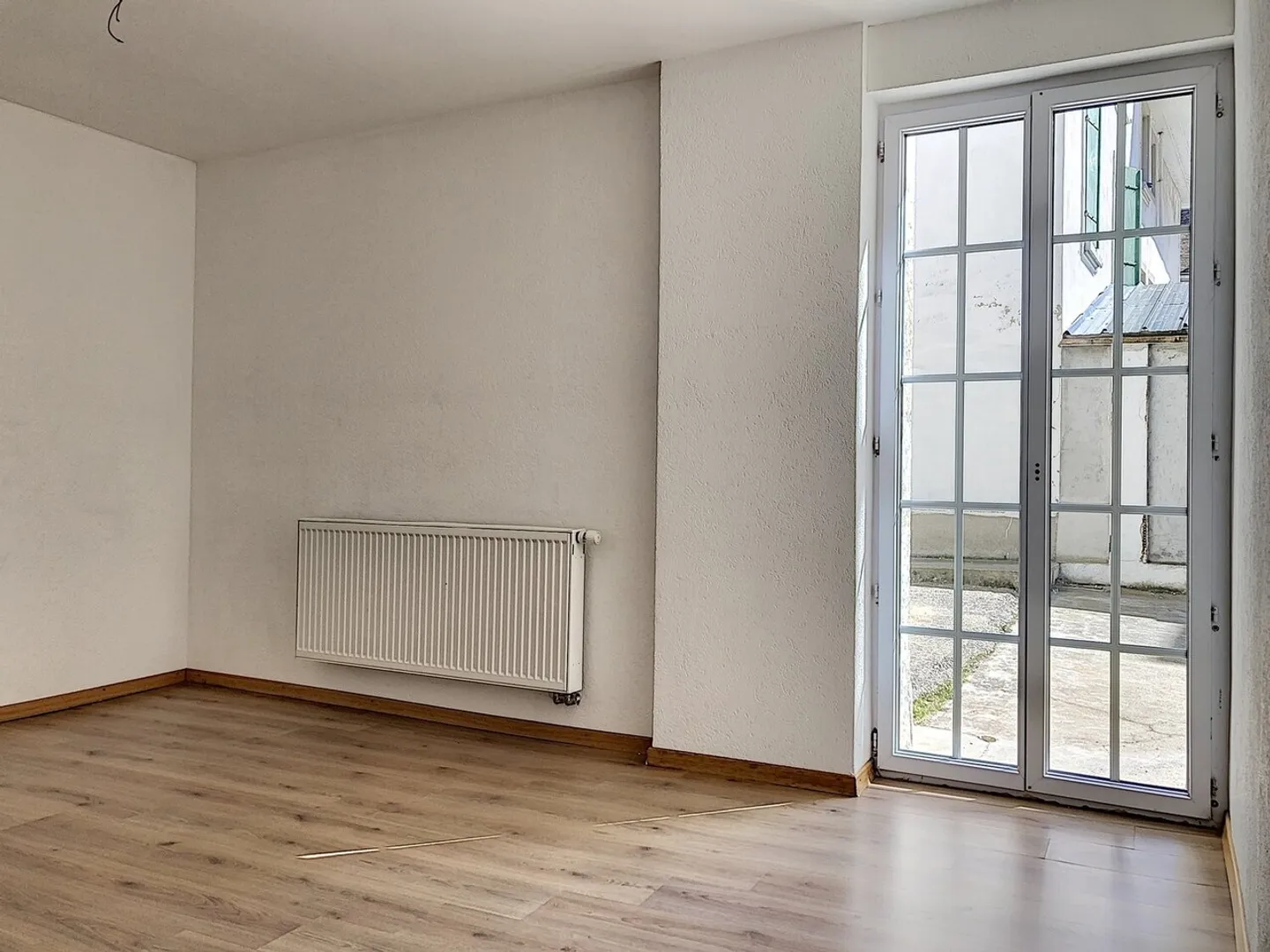 Charming 3.5-room apartment in Payerne - Photo 2 of 7