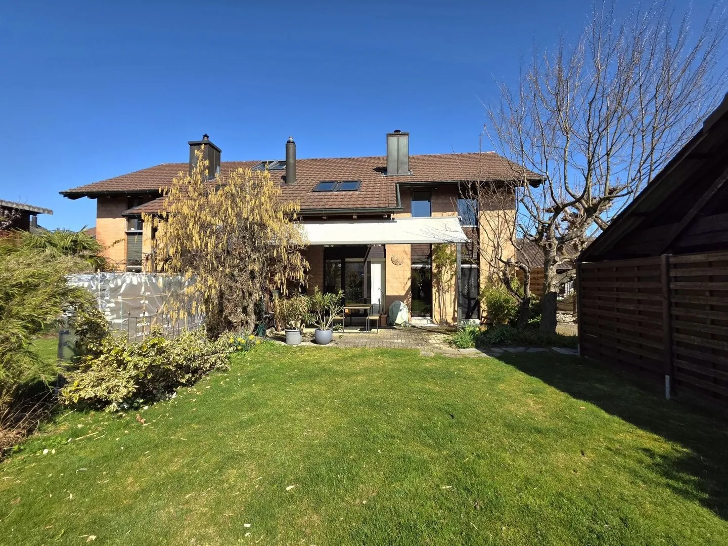Stylishly modernized, semi-detached single-family house with sunny garden - Photo 1 of 13