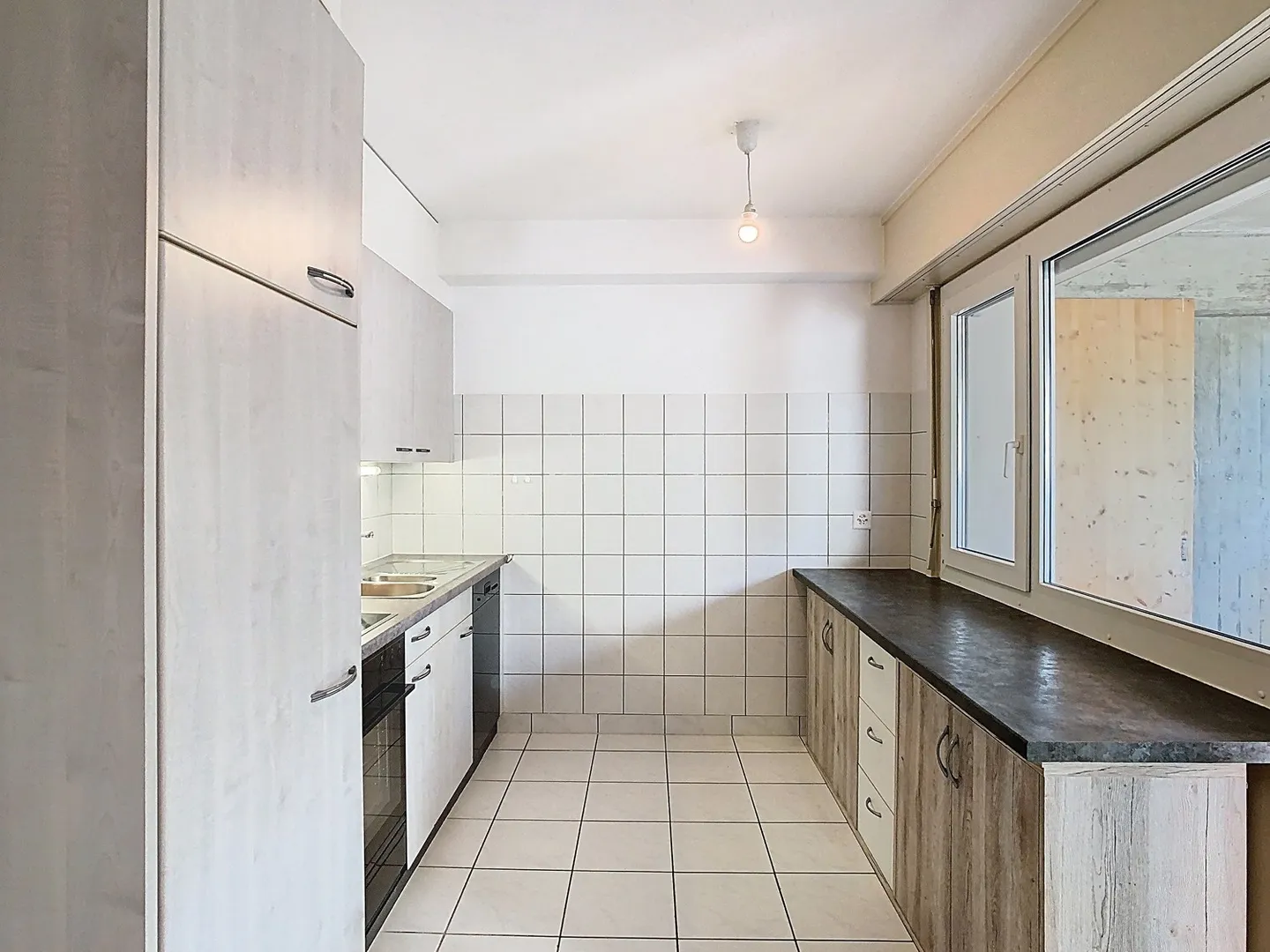 SCHÖNE 3½ ZIMMER IN EINER GRÜNEN UMGEBUNG - Foto 2 von 12