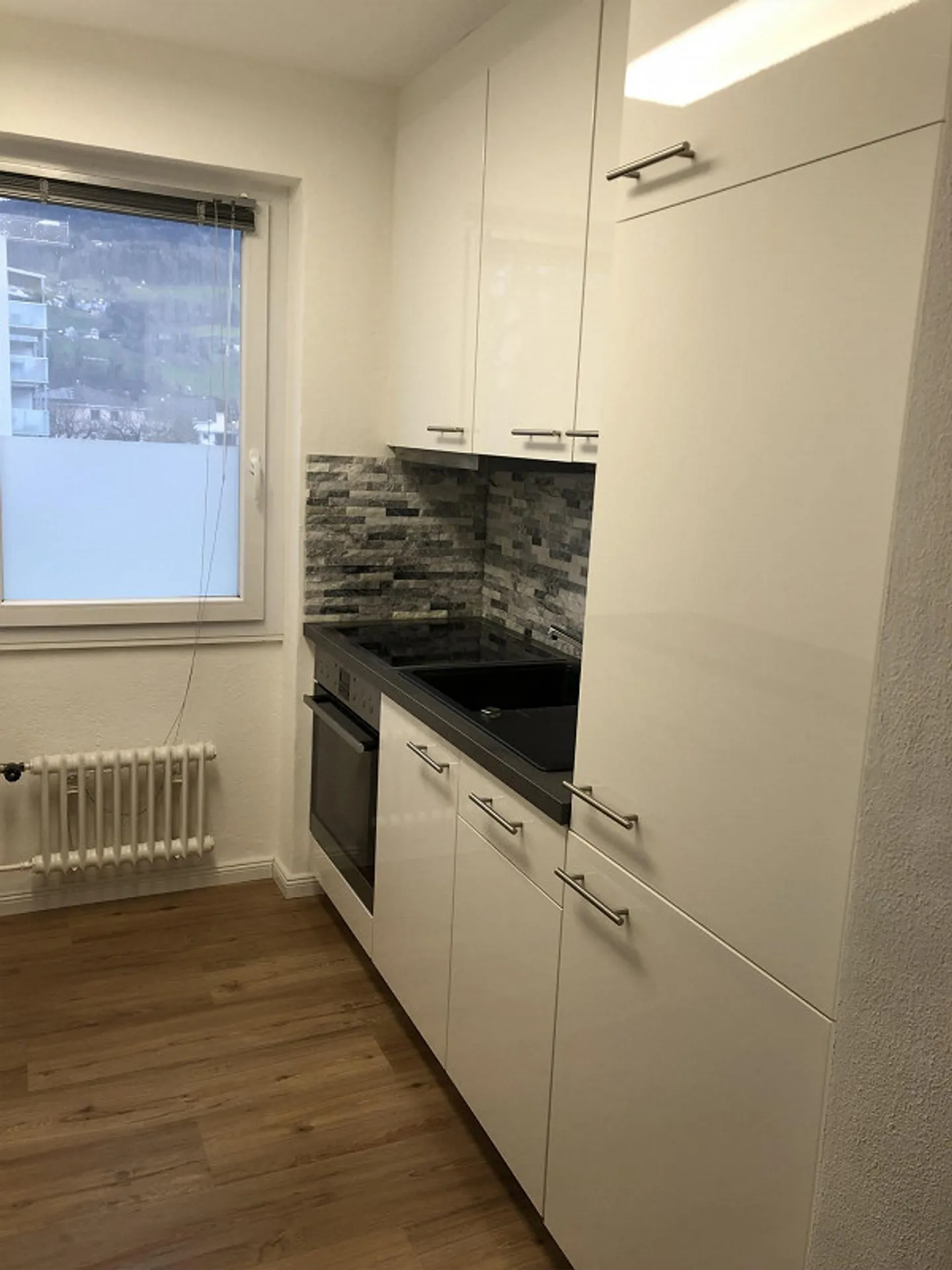 Appartement 2,5 pièces - Photo 6 sur 7
