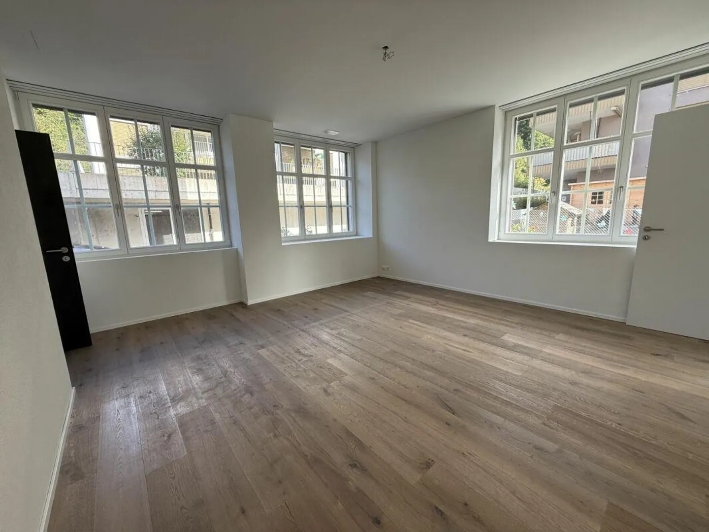 Appartement de 4,5 pièces de style loft, adapté aux familles, avec patio - Photo 7 sur 13